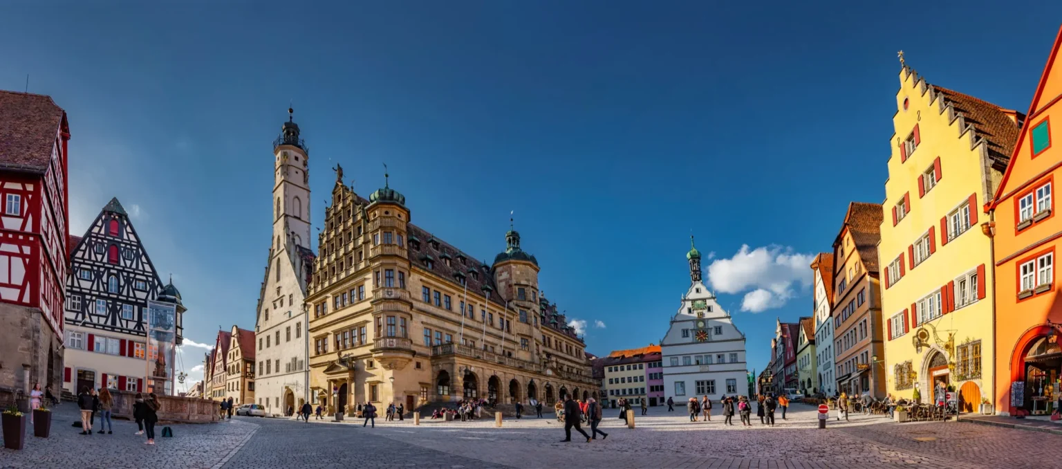 Market Square in Rothenburg ob der Tauber with the Town Hall and the Ratstrinkstube in sunshine