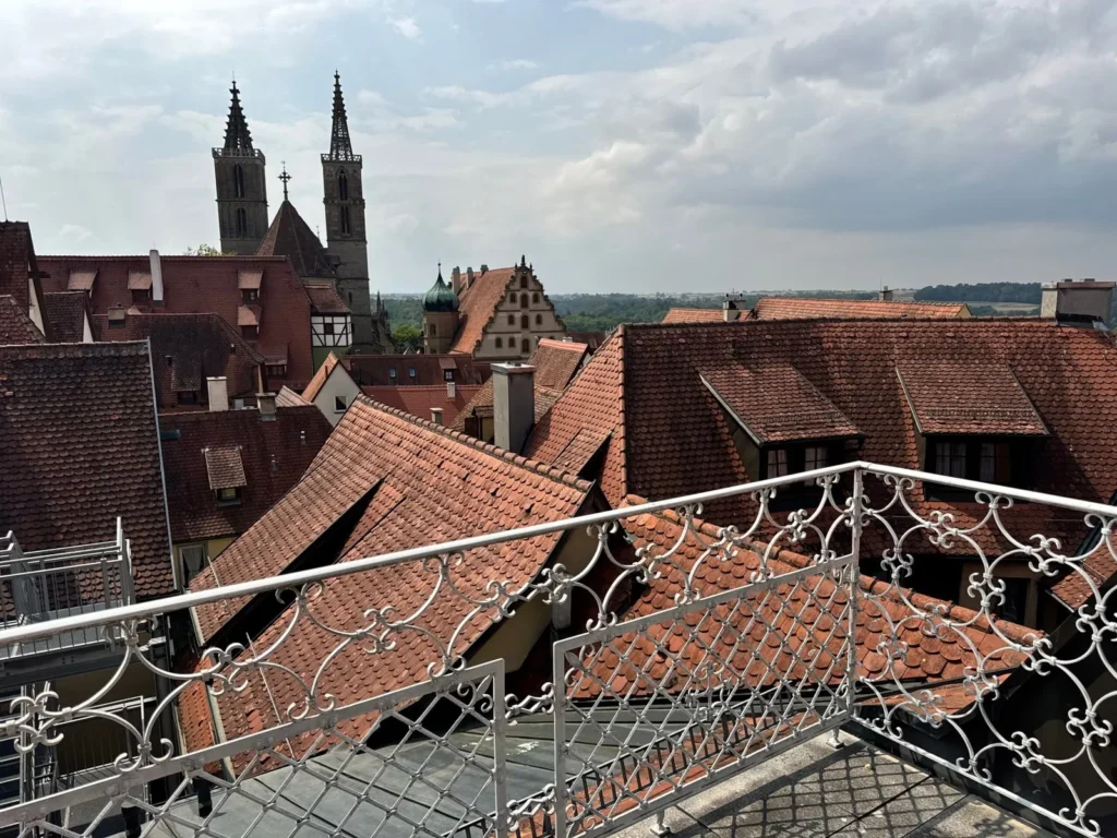 View over the red tiled roofs of Rothenburg ob der Tauber to the towers of St Jakob’s Church